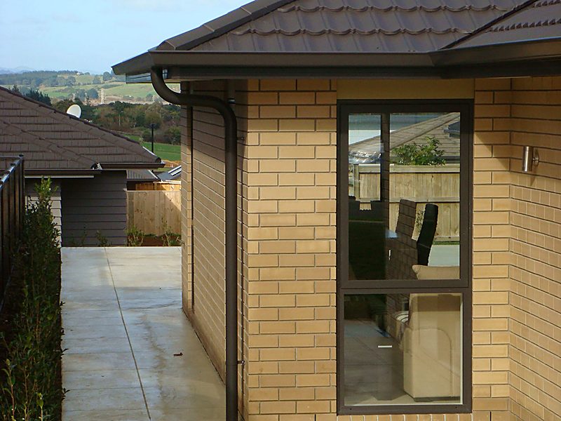 Completed guttering on a brick and tile home
